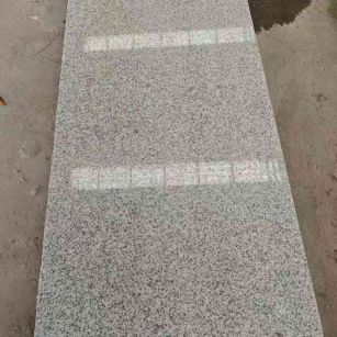 芝麻白光面毛板